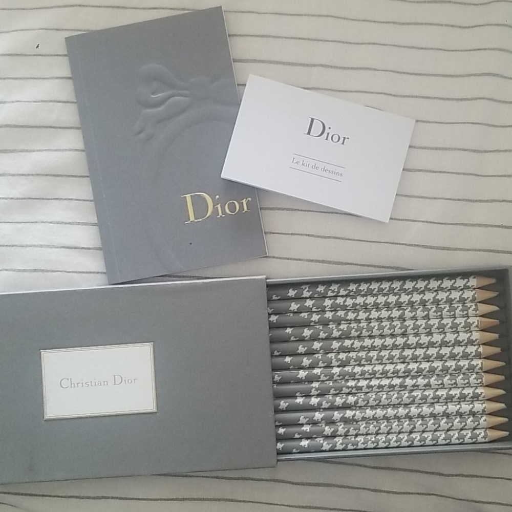 Christian Dior notebook and pencil set.